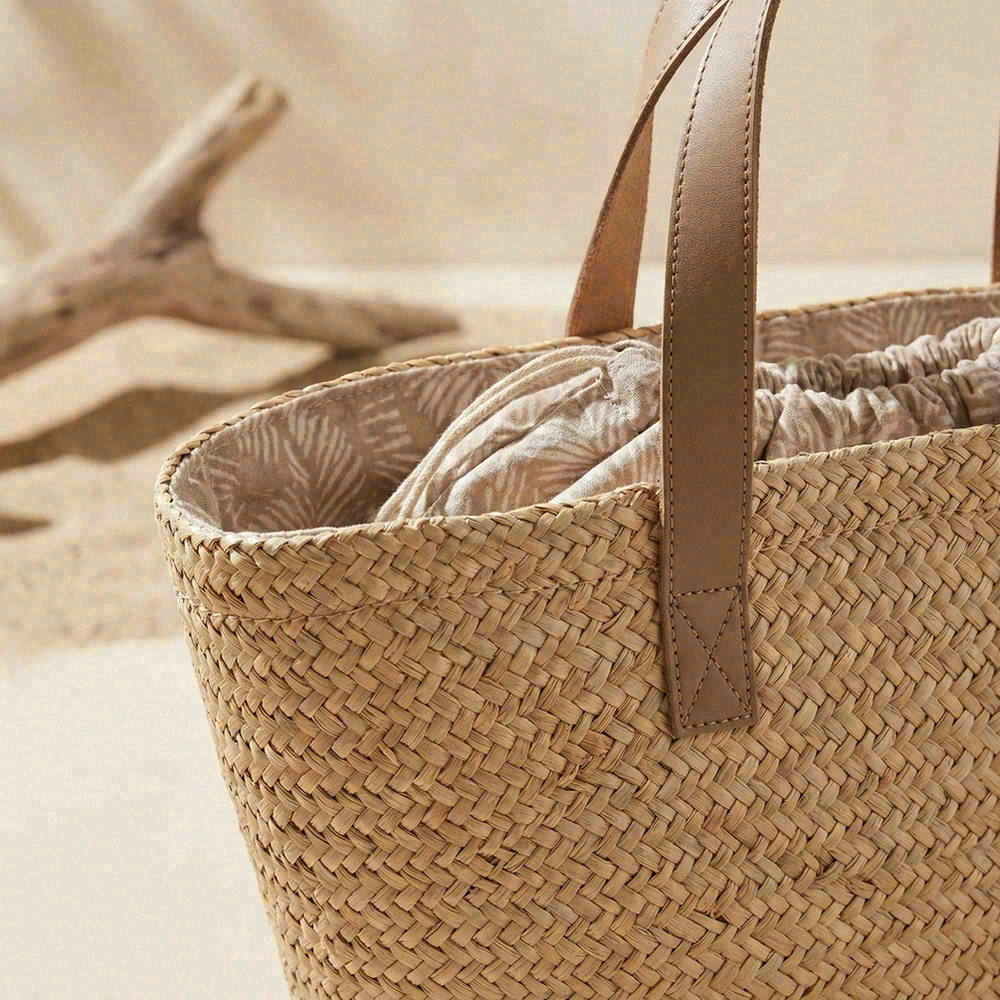 Lined straw tote with sturdy handles